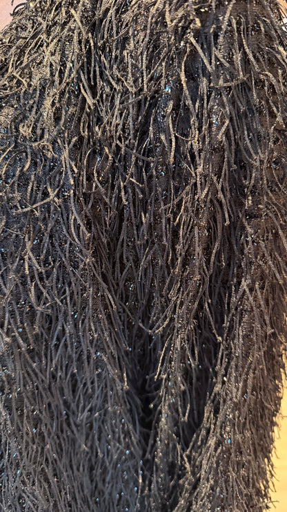 Sparilegur jakki með kögri