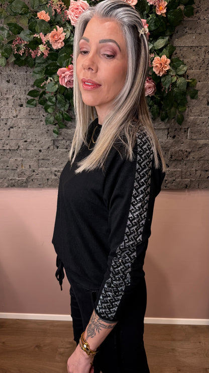 Peysa með glimmer rönd